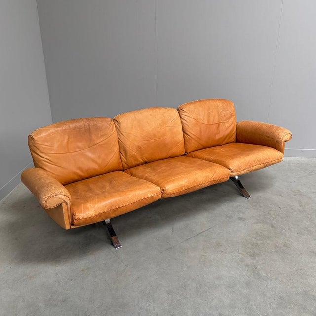 Vintage De Sede sofa, model DS 31. Cognac leather upholstery with aluminium base. Sofa is in very good condition. Leather...
