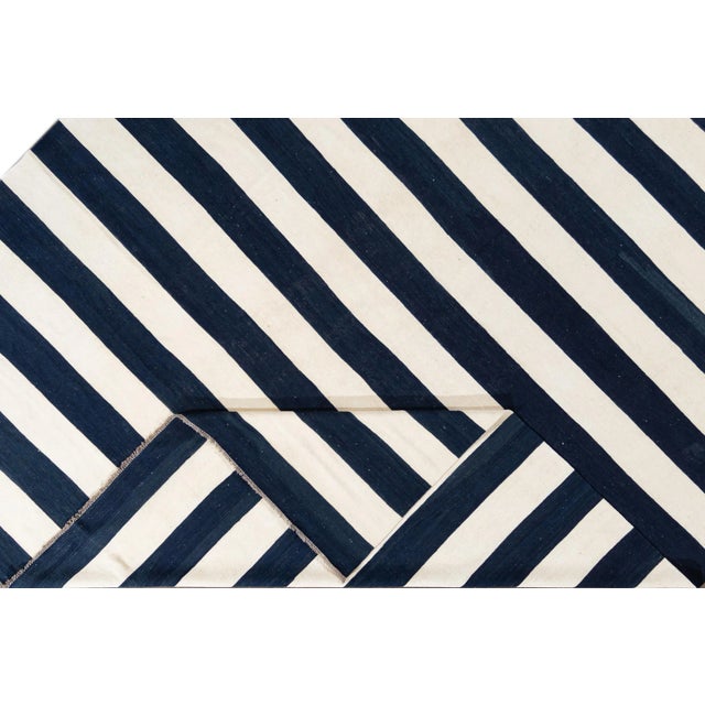 Beautiful 21st century contemporary Kilim Rug, handwoven wool in an all-over blue and white striped design. This rug...