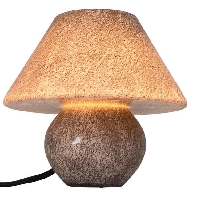 Italian glass lamp made with a stone like motive. Marked with the orinal sticker and in top condition. A small lamp that...