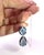 This enchanting double-drop pendant necklace showcases a dreamy, ethereal quality with two luminous cabochon moonstones...