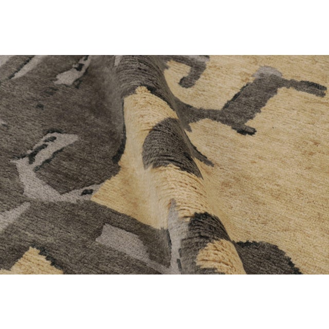 Hand-knotted in wool, this 8x10 contemporary runner is a brilliant celebration of modern geometry. It features a striking...