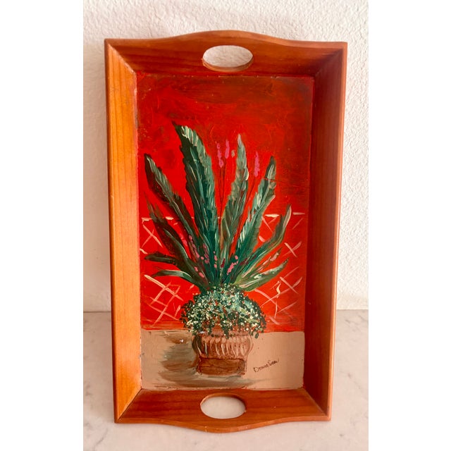 This fabulous folk art wooded serving tray features a hand painted potted succulent on the surface of its face. Signed by...