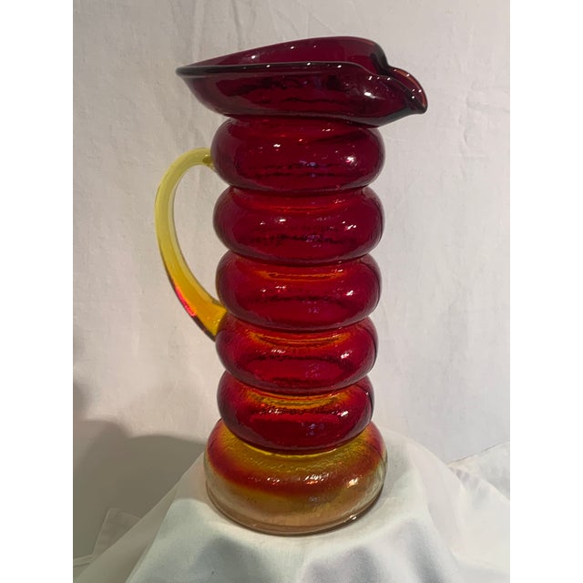 Up for sale is a fun and multi-faceted amberina caterpillar pitcher in a stunning color combination of honey yellow and...