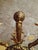 Eight-arm cast chandelier made of polished brass. Rich plant and figural decoration. The chandelier is for classic candle...