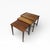 A beautifully proportioned Gordon Russell walnut nest of tables, showcasing the refined craftsmanship and understated...