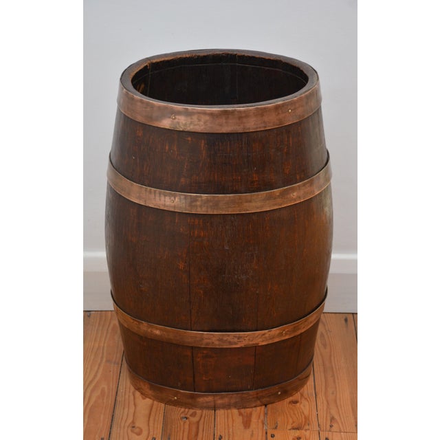K0651 antique victorian solid oak coopered sherry or whisky barrel umbrella stand of oval outline, having a generous...