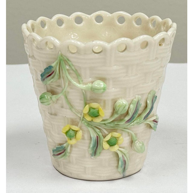 Vintage Belleek Ireland porcelain delicate yellow floral basketweave motif spill vase. Made in Ireland. Marked to...
