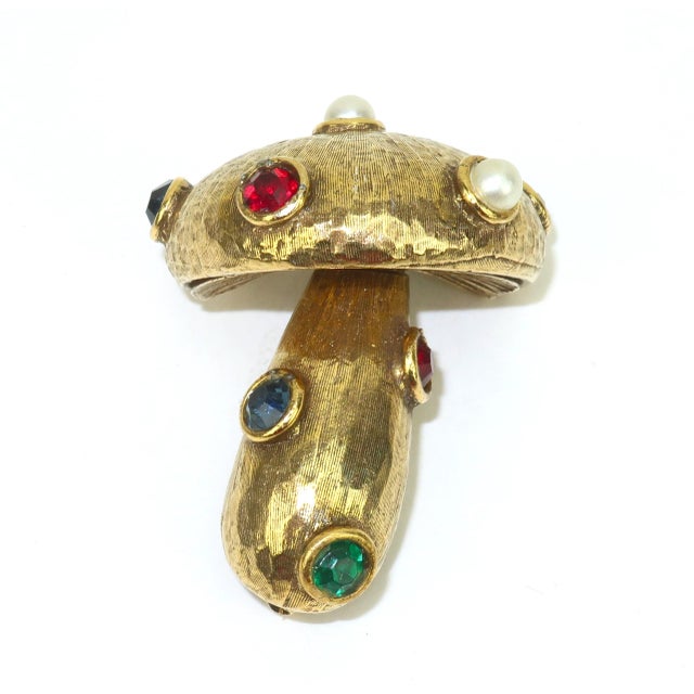 Magical magnificent mushroom! This 1960's Jeanne gold plated mushroom brooch is the perfect lapel companion. The body of...