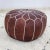 Matériaux : Cuir, Cuir naturel, Cuir marocain Largeur: 20 pouces Hauteur: 12 pouces Transform your space with this...