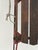 Classic vintage Gladding “American Flyer” wooden sled with red-painted metal runners, bentwood-style handle assembly, and...