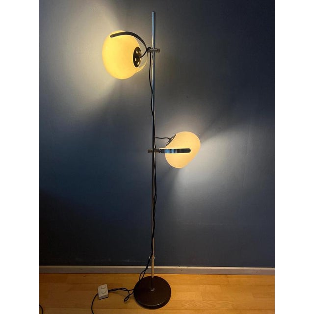 A beautiful vintage space age floor lamp with white mushroom shades by Dijkstra. The mushroom shades can be turned in any...