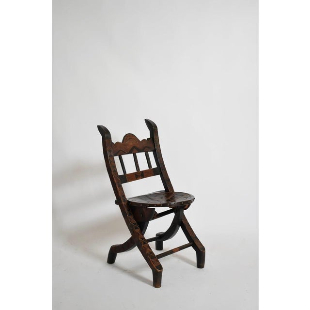 Wooden Senoufo chair, 1960s. Height: 86 cm - 33.86 in Length: 43 cm - 16.93 in Width: 43 cm - 16.93 in Seating height: 45...