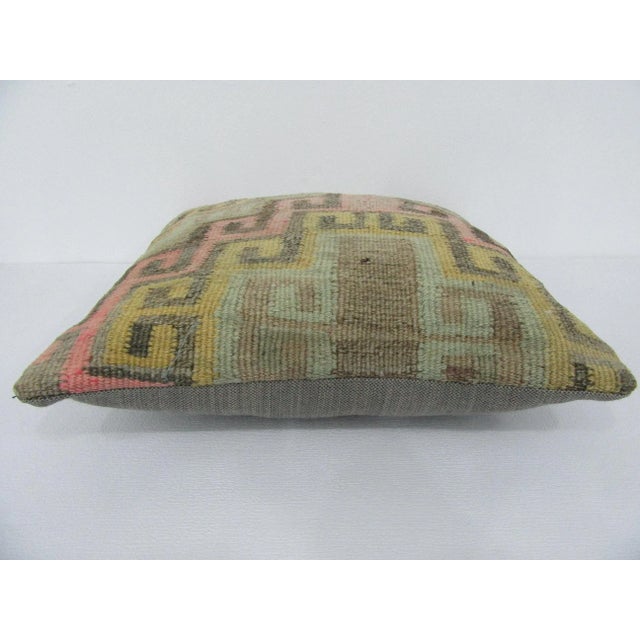 Handmade decorative pillow cover made from a vintage Turkish kilim rug. Backed with good quality cotton fabric. Pillow...