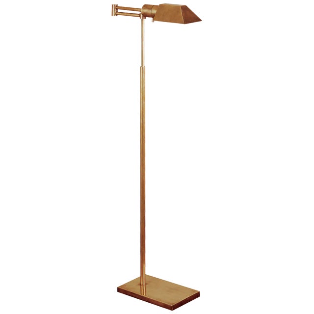 Studio Swing Arm Floor Lamp in Hand-Rubbed Antique Brass Height: 43" - 57" Extension: 20" Base: 6" x 9" Rectangle Socket:...