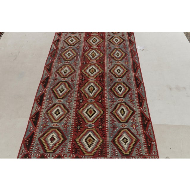 Hailing from Turkey circa 1940s, a mid-century kilim rug now joining Rug & Kilim’s vintage tribal selections. Specifically...