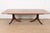 A rare and outstanding Georgian or Regency style double pedestal extension dining table By Baker Furniture, "Stately Homes...