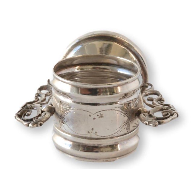 A rare Victorian napkin ring with built-in bud vase holder, crafted by Webster Mfg Co. of Brooklyn, NY. This silver plate...