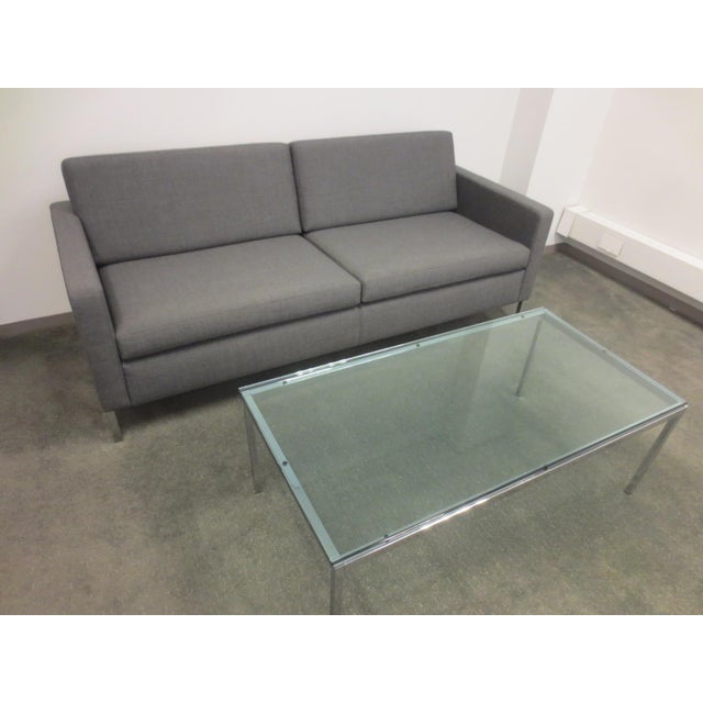 The Florence Knoll Rectangular Glass Coffee Table is a refined piece that highlights modernist principles with clean lines...