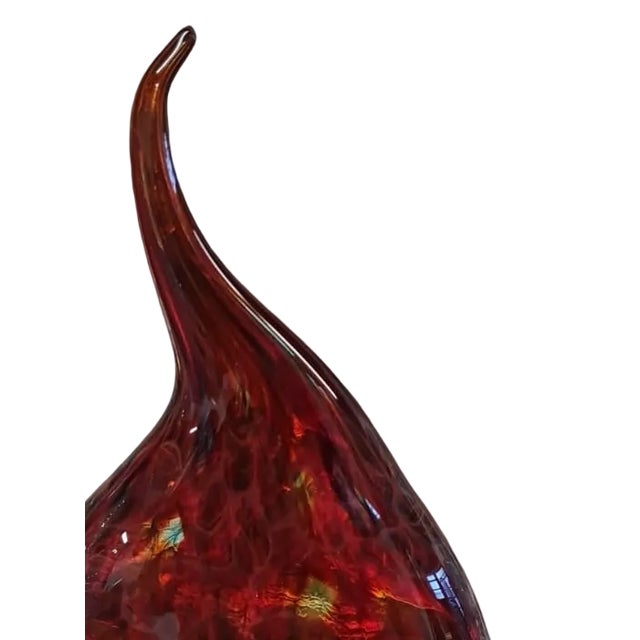 DUTIES FREE A vibrant expression of tradition, color, and craftsmanship. This Murano glass vase is created using the...