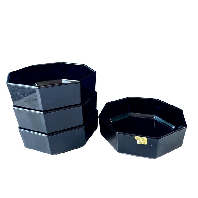 Set of 4 vintage Arcoroc Octime black glass bowls, made in France in the 1980s. These sleek and glossy bowls feature the...