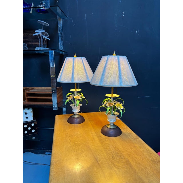 Italian Painted Toll Flower Table lamps. Newly rewired and ready to go with older String Shades that still look good!...