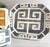 An octagonal platter finished in a solid graphite glaze with a hand-painted Greek key border running the full edge. Made...
