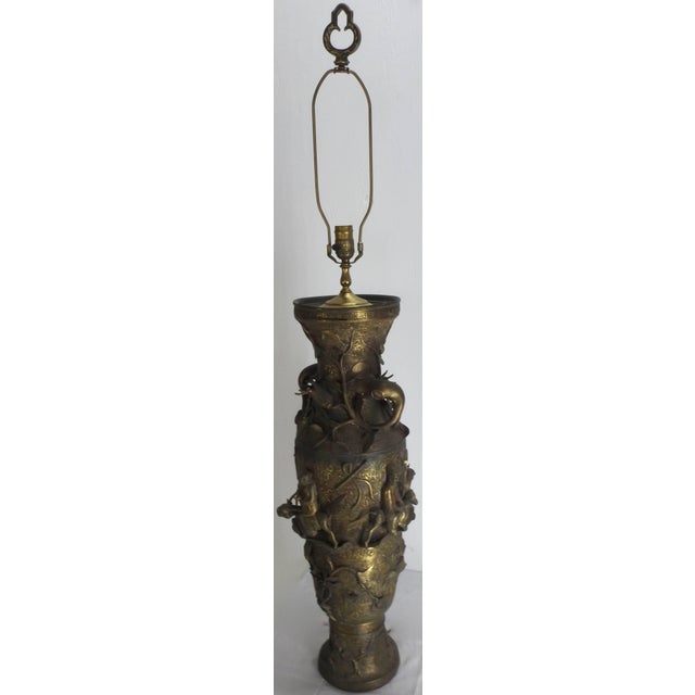 The detailed repousse metalwork on this magnificent bronze lamp featuring water buffalo with riders is outstanding! The...