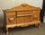 19th century Biedermeier style sideboard with a passthrough design. The book matched burl veneer and detailed carpentry,...