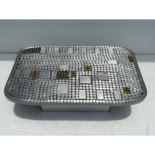 Brutalist mosaic aluminum coffee table with brass detailing by Belgian artist furniture maker Raf Verjans.