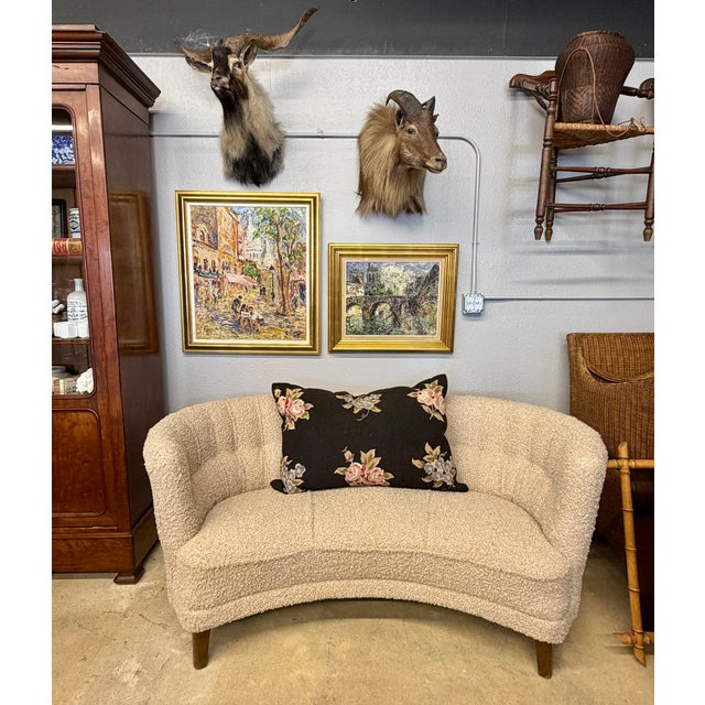 An iconic example of mid-century Scandinavian comfort, this classic Danish "Banana" sofa is so named for its elegant,...