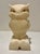 This mid-century stylized, anthropomorphic owl design has prominent circular glasses around its inlaid yellow glass eyes...