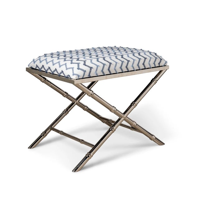 Classic detail of bamboo is featured on the Lauderdale upholstered bench. Cast steel metal frames are available in aged...