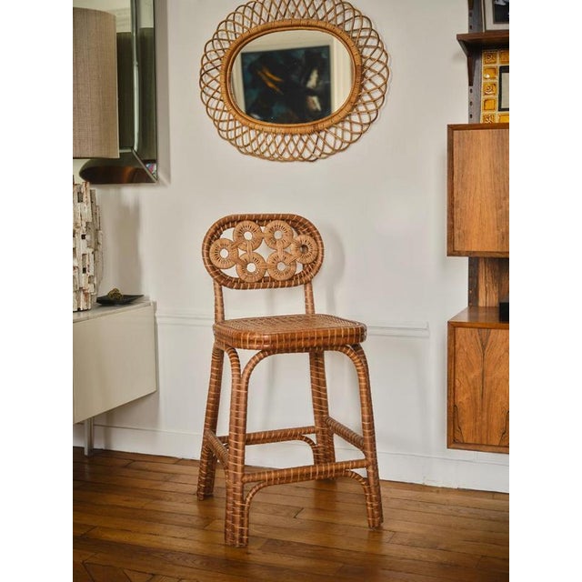 Bridget barstool in stained rattan and plywood by popus editions. Dimensions: w 45 x d 55 x h 104 cm. Materials: stained...
