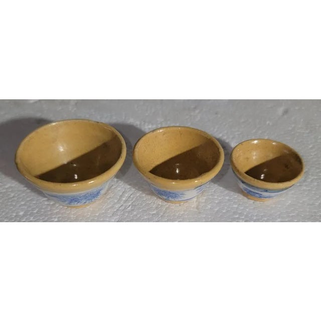 Set of Three Miniature yellow ware bowls. Each bowl is hand made and hand painted. Great color. This set was meticulously...