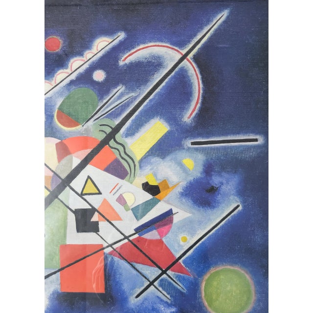 A framed poster of Wassily Kandinsky's (1866-1944) "Blue Painting (Blaues Bild)" was completed in 1924 and its part of the...