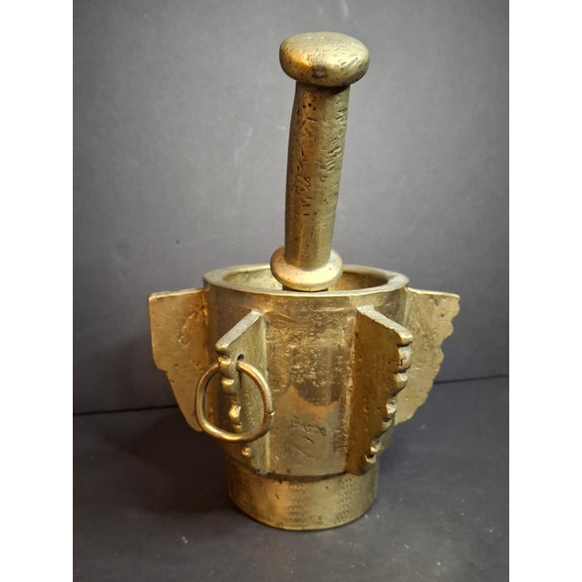 Offered is an exceptional, museum-grade antique cast bell metal bronze or heavy brass alloy Judaica mortar and matching...