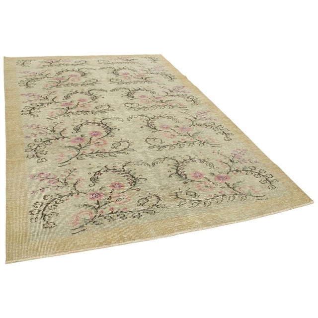 Elevate your home with the timeless charm of a vintage overdyed rug. Handwoven by skilled artisans, each rug tells a story...