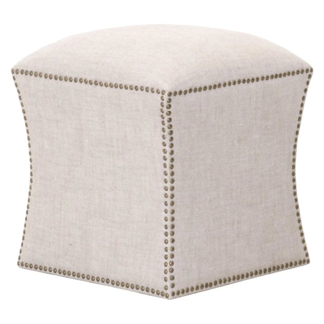 Add additional seating or serving space with this square ottoman. It is fully upholstered with a gorgeous linen and...