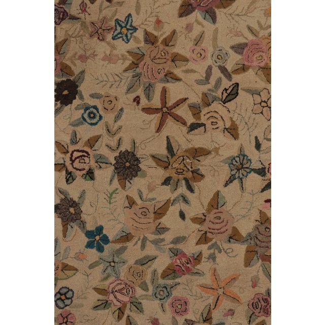 This 8x12 antique hooked rug is an exciting addition to Rug & Kilim’s collection, a charming example of American folk art,...