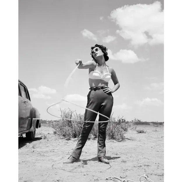 Elizabeth Taylor Spinning Lasso in "Giant" Archival Pigment Print For Sale