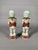 CHINA, Kangxi period, 18th century. Pair of porcelain figures depicting the twin brothers Hoho Erxian standing on...