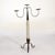 A captivating pair of Spanish Baroque-style floor candlesticks that are highly sculptural as well as functional. Each...