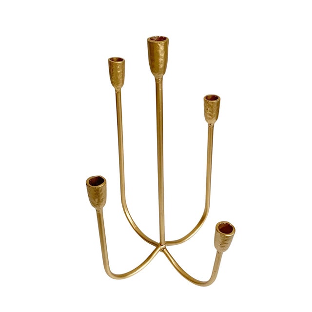 Elevate your home decor with the Goldtone Textured Metal 5 Candle Tiered Candelabra, a stunning centerpiece that combines...