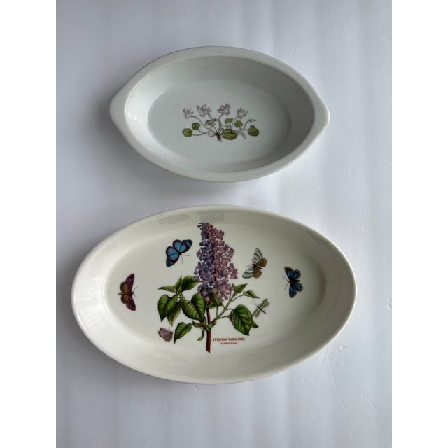 Two botanical serving dishes. Large oval serving dishes with 7W x 11L x 1.5"H. Fire & Ice Botanic garden. Small with lily...