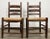 Pair of primitive handmade ladderback chairs featuring woven seats. Wonderful turned wood details to frames. Four legs...
