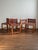 This set of four vintage dining chairs was crafted in the 1940s and imported from Tuscany. Built from solid wood and...