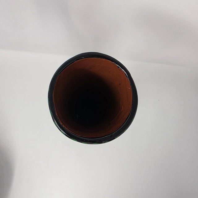 Add a striking statement piece to your décor with this authentic Mexican Talavera pottery vase, beautifully hand-painted...