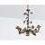 French vintage tôle chandelier, circa 1950, the metal carefully forged and wrought into romantic vines of blooming flowers...