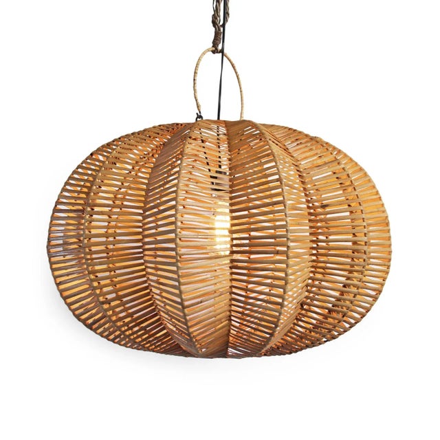 Handmade split stain rattan pumpkin lantern. Overall measurements are 24" x 24" x 20" with 4" top ring. Each lantern may...