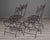 Metal Set of Four French Iron Curule Side Chairs With Woven Strap Seats For Sale - Image 7 of 12